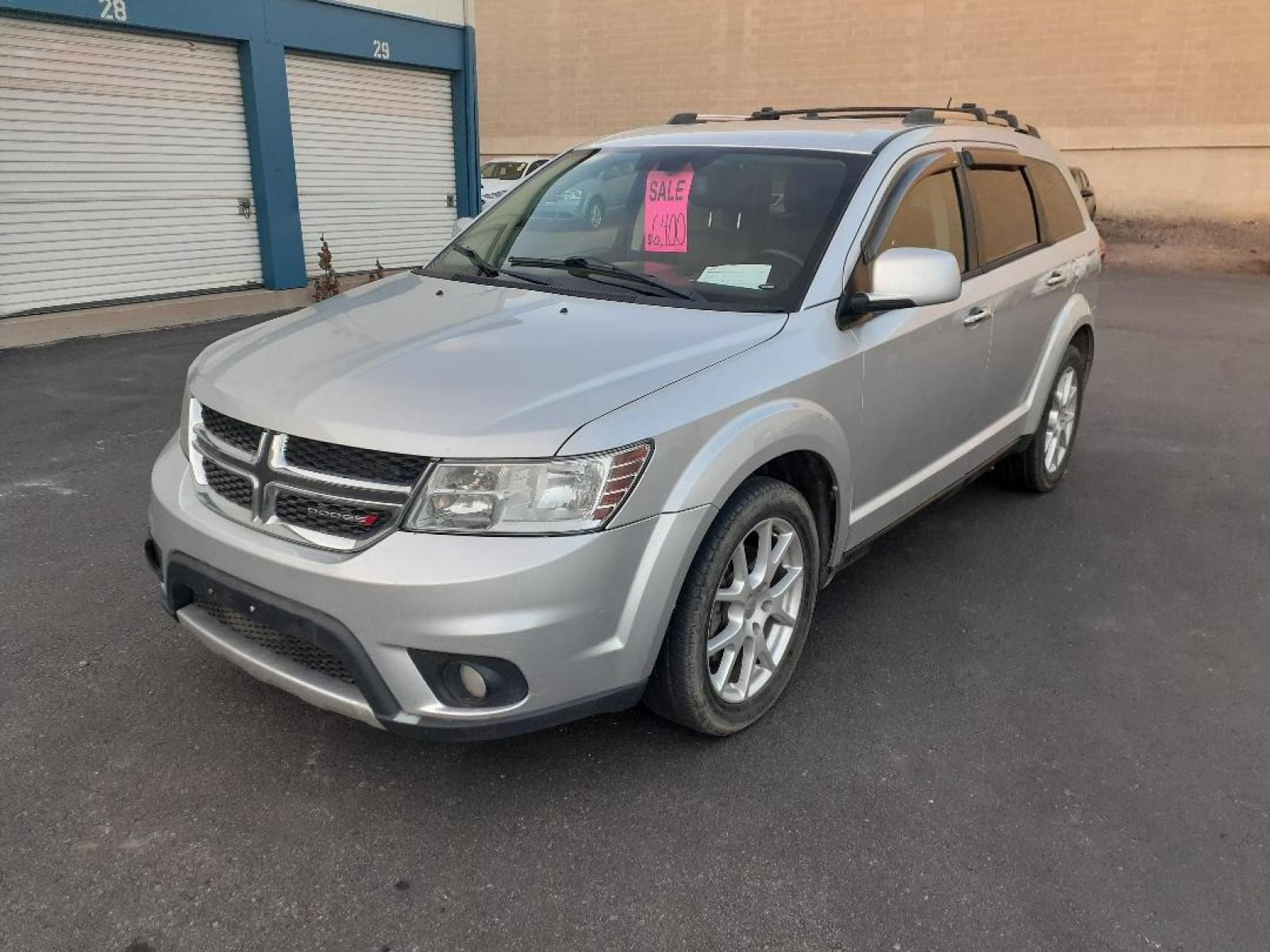 2013 Dodge Journey (3C4PDDFGXDT) with an 3.6L V6 DOHC 24V engine, 6-Speed Automatic transmission, located at 2015 Cambell Street, Rapid City, SD, 57701, (605) 342-8326, 44.066433, -103.191772 - CARFAX AVAILABLE - Photo #2